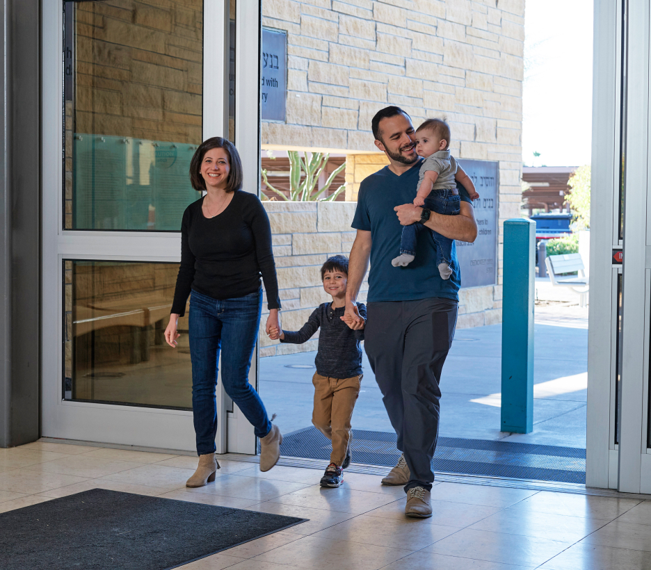A family entering the JCC building.