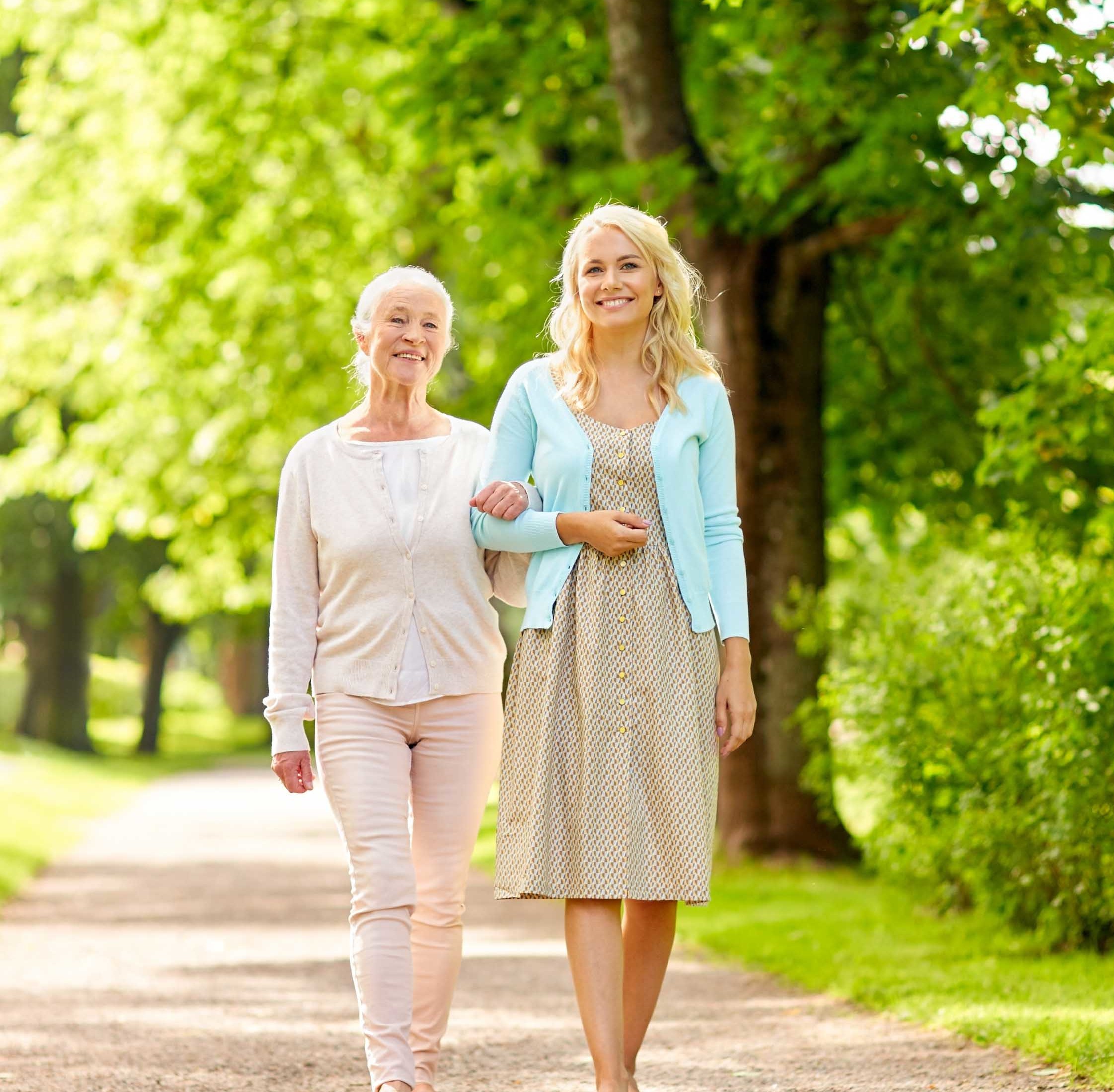 Two woman walking together.
