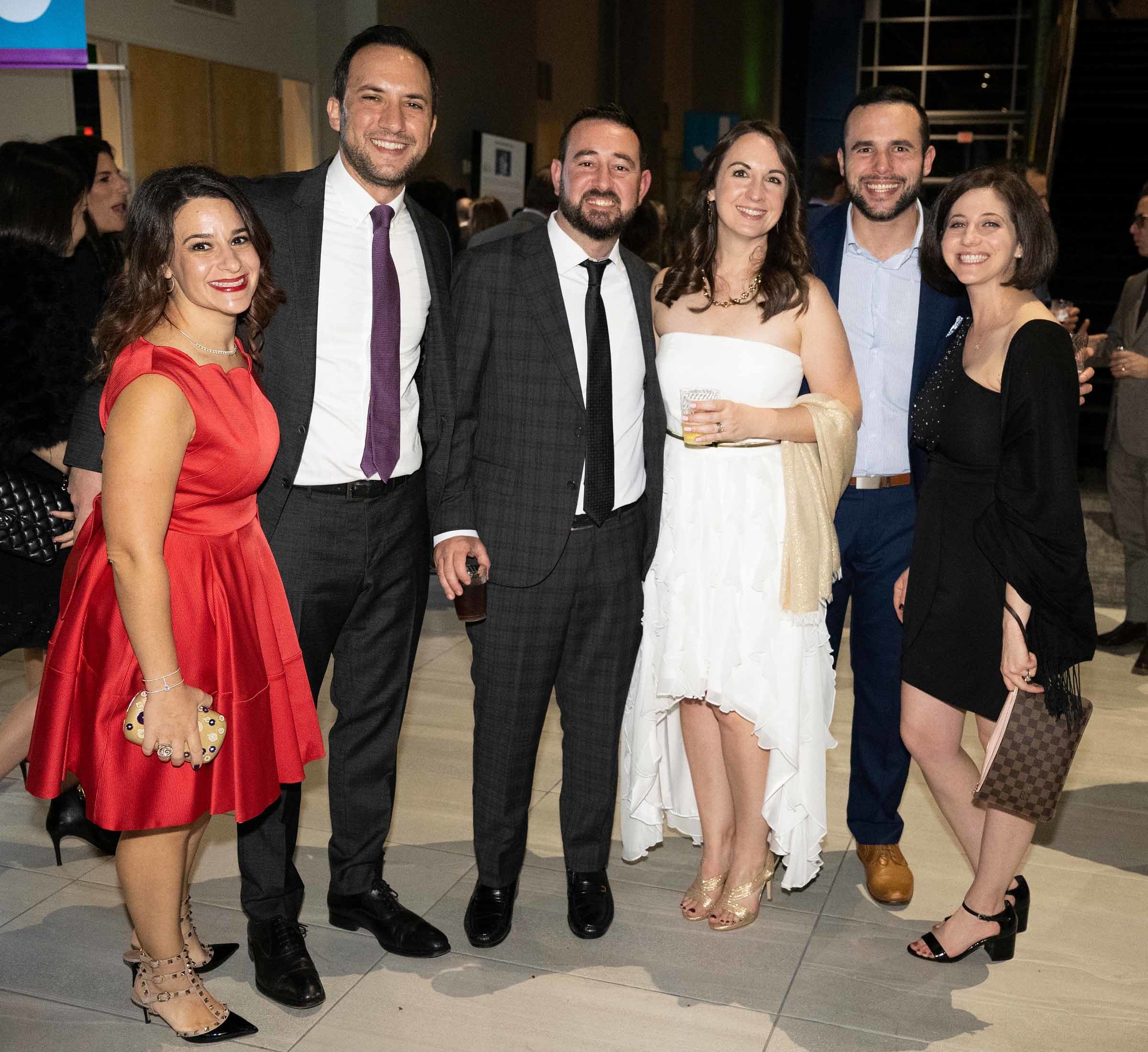 A group of people at a gala.